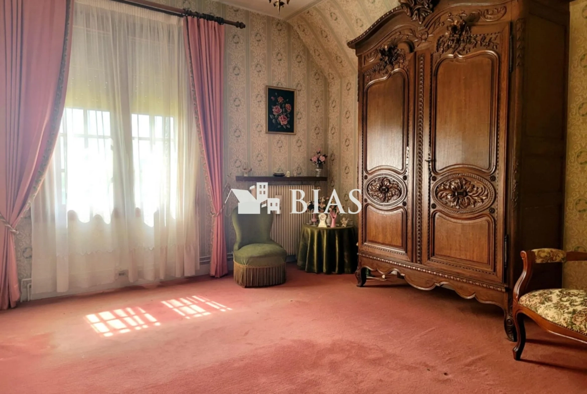 Maison à vendre au Trait avec jardin, garage et potentiel de rénovation 