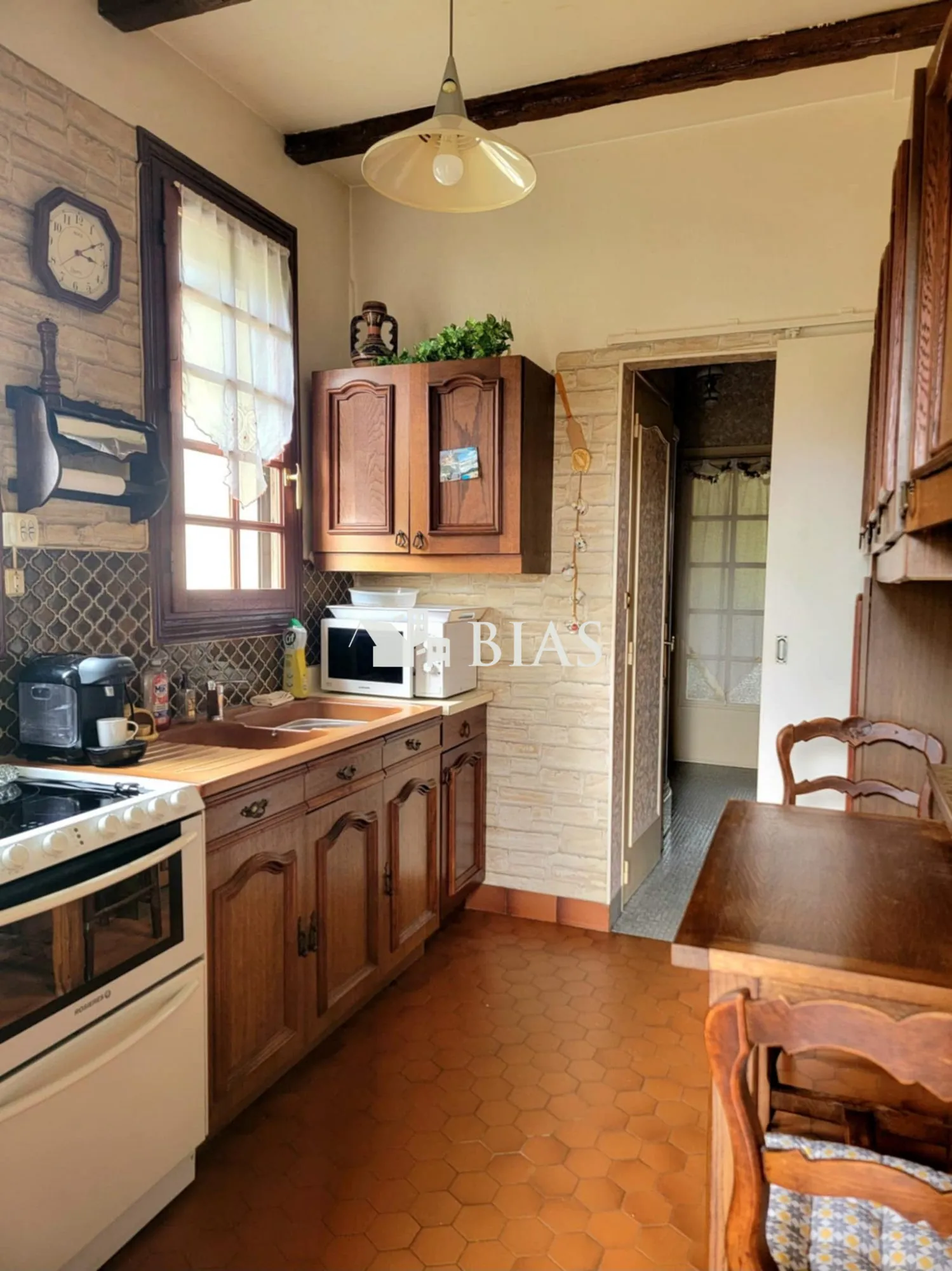 Maison à vendre au Trait avec jardin, garage et potentiel de rénovation 