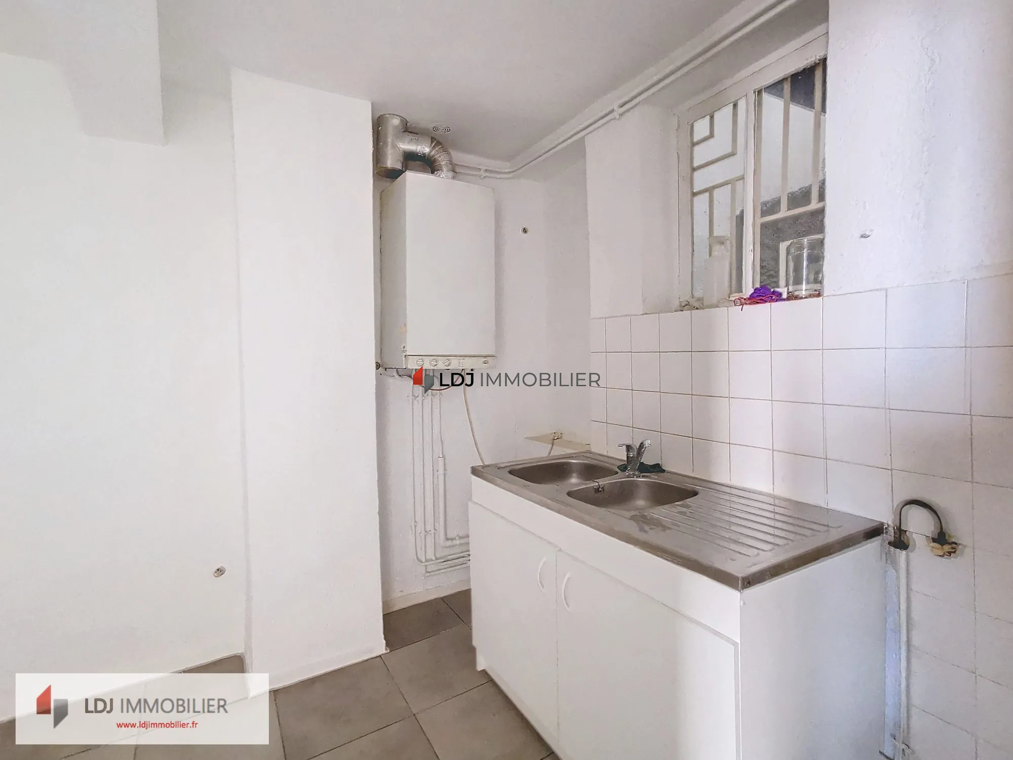 Investissement immobilier à Perpignan - Immeuble avec plusieurs appartements loués 