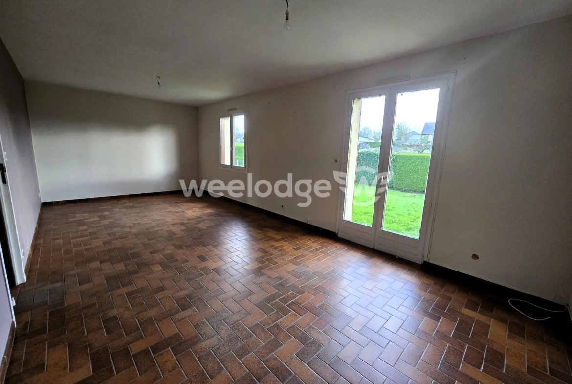 Maison à vendre à Grumesnil - Pavillon de plain-pied avec jardin et garage 