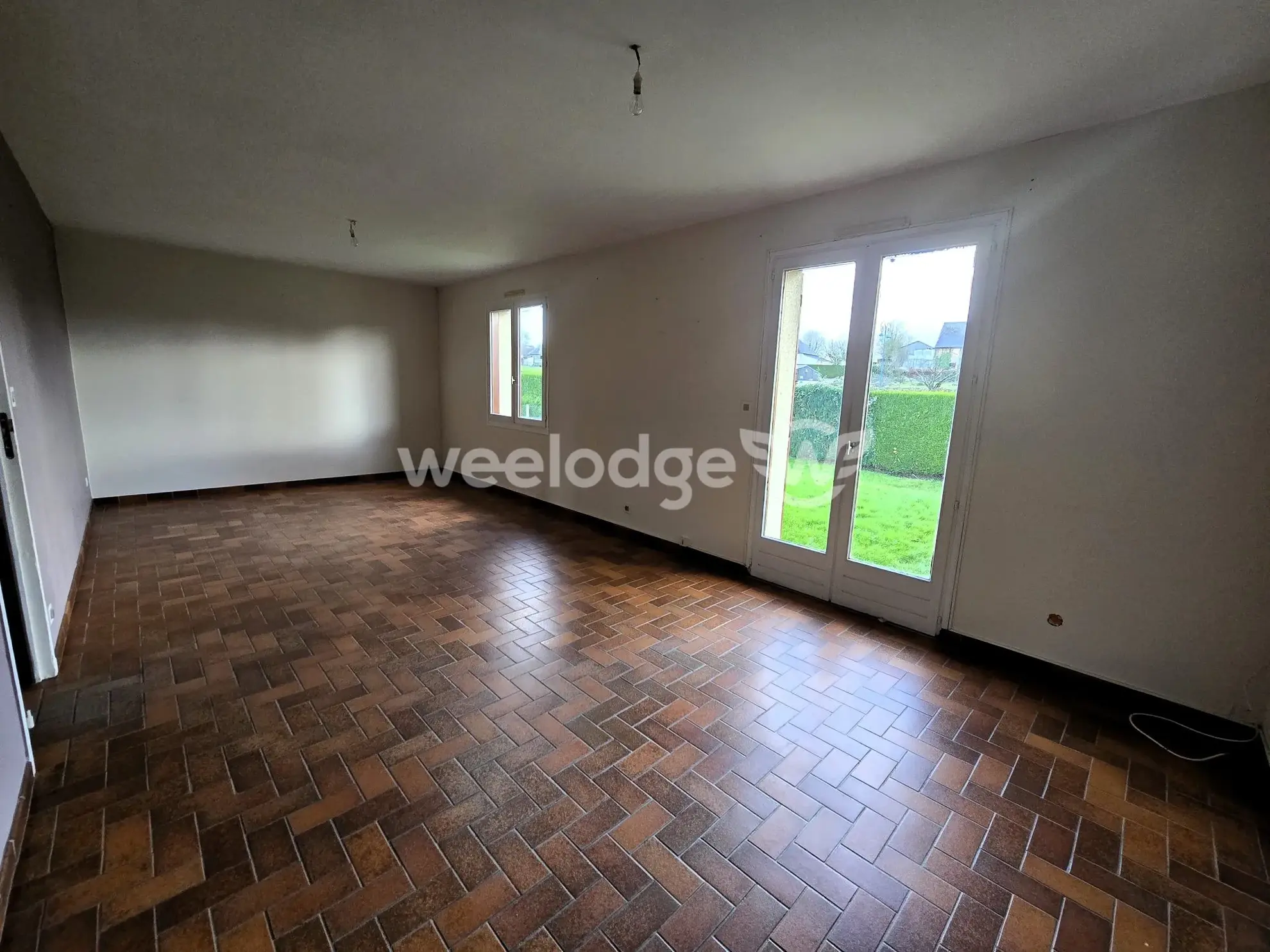 Maison à vendre à Grumesnil - Pavillon de plain-pied avec jardin et garage 