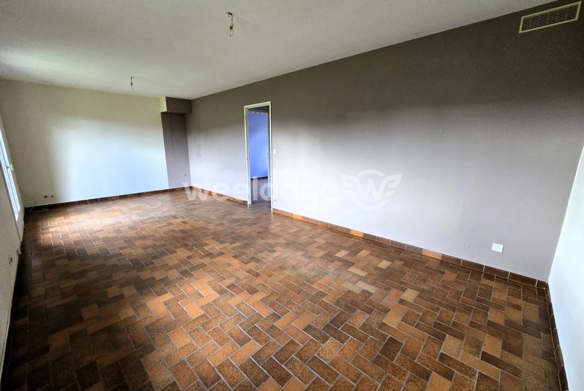 Maison à vendre à Grumesnil - Pavillon de plain-pied avec jardin et garage 