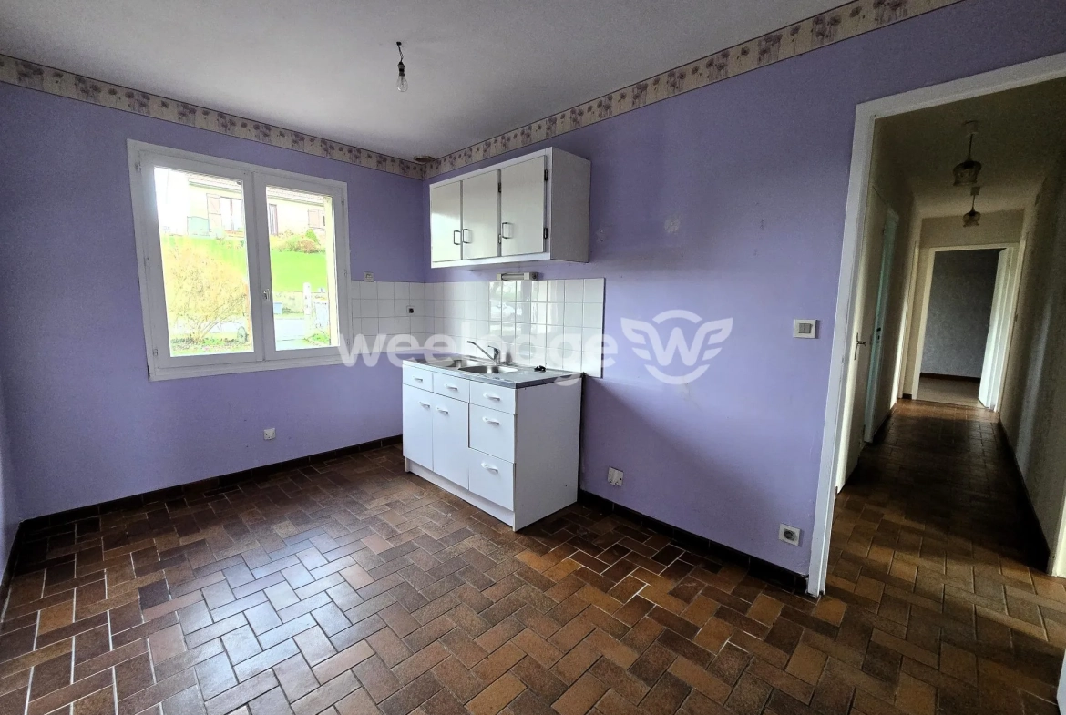 Maison à vendre à Grumesnil - Pavillon de plain-pied avec jardin et garage 