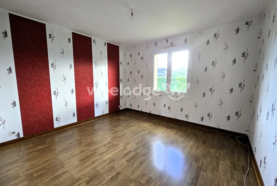 Maison à vendre à Grumesnil - Pavillon de plain-pied avec jardin et garage 