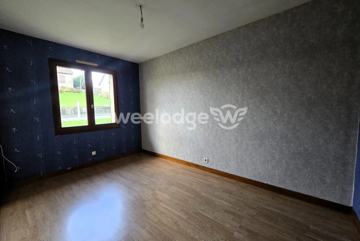 Maison à vendre à Grumesnil - Pavillon de plain-pied avec jardin et garage 