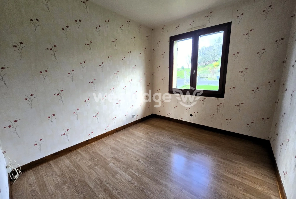 Maison à vendre à Grumesnil - Pavillon de plain-pied avec jardin et garage 