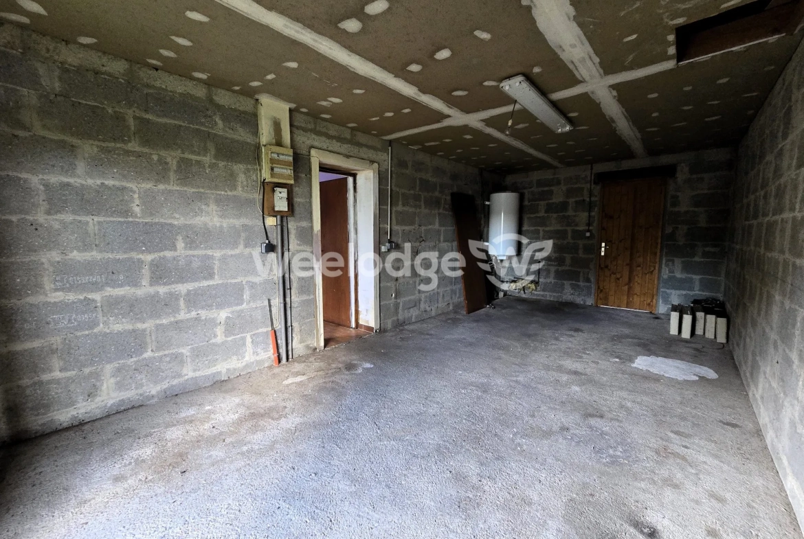 Maison à vendre à Grumesnil - Pavillon de plain-pied avec jardin et garage 