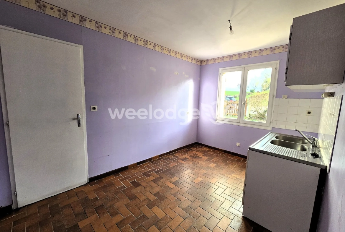 Maison à vendre à Grumesnil - Pavillon de plain-pied avec jardin et garage 