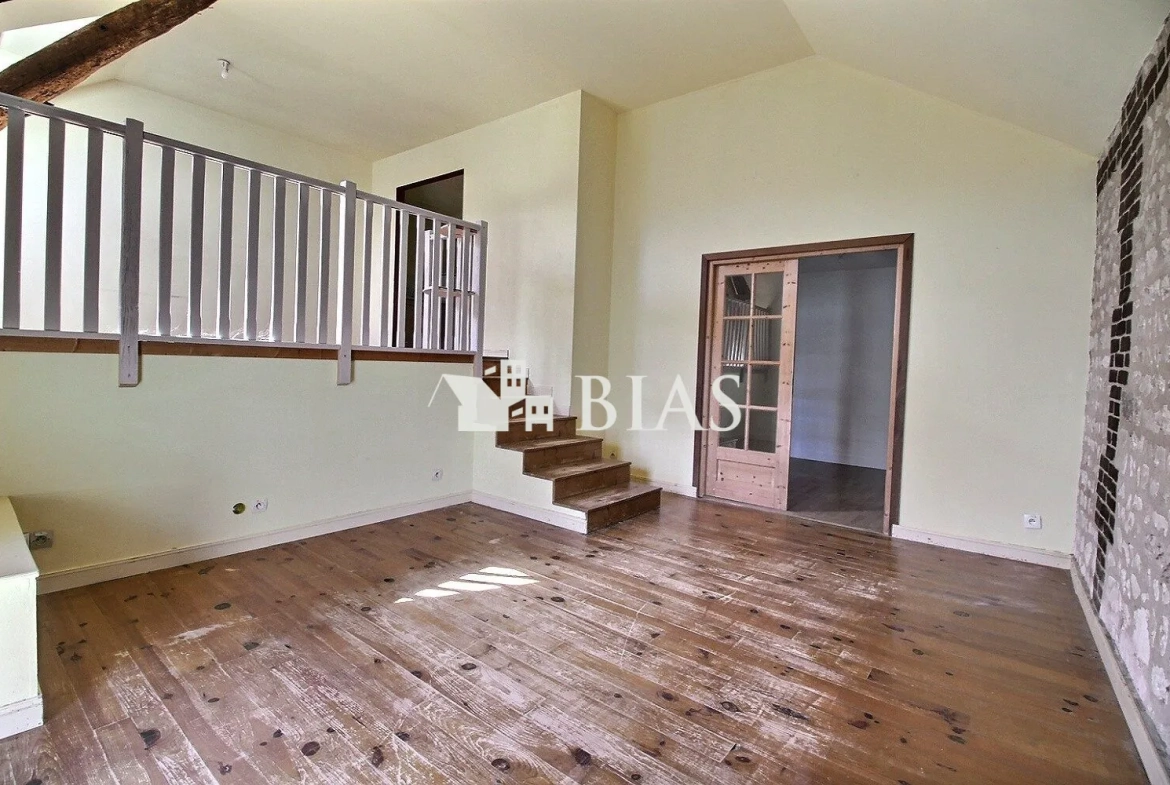 Maison atypique de 99 m² avec terrasse et cave proche écoles - Le Manoir 
