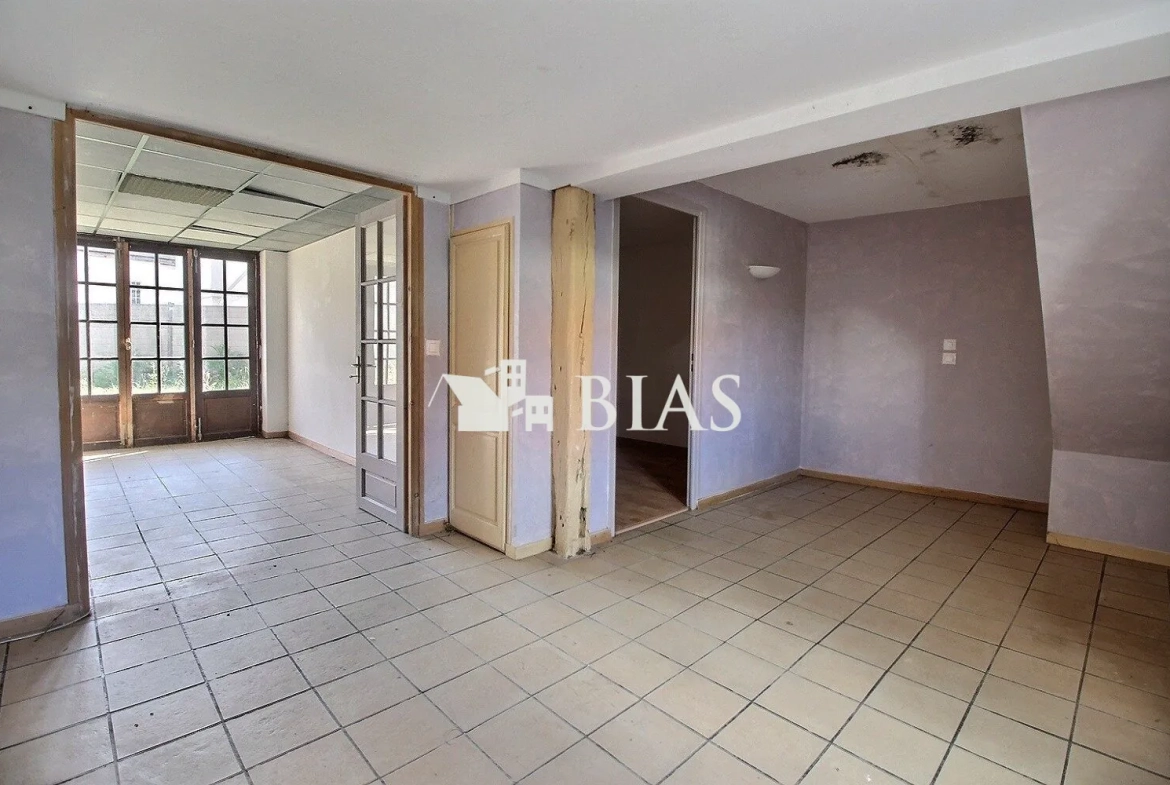 Maison atypique de 99 m² avec terrasse et cave proche écoles - Le Manoir 