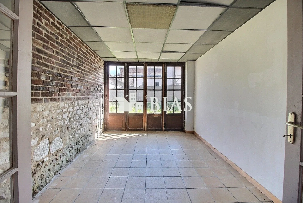 Maison atypique de 99 m² avec terrasse et cave proche écoles - Le Manoir 