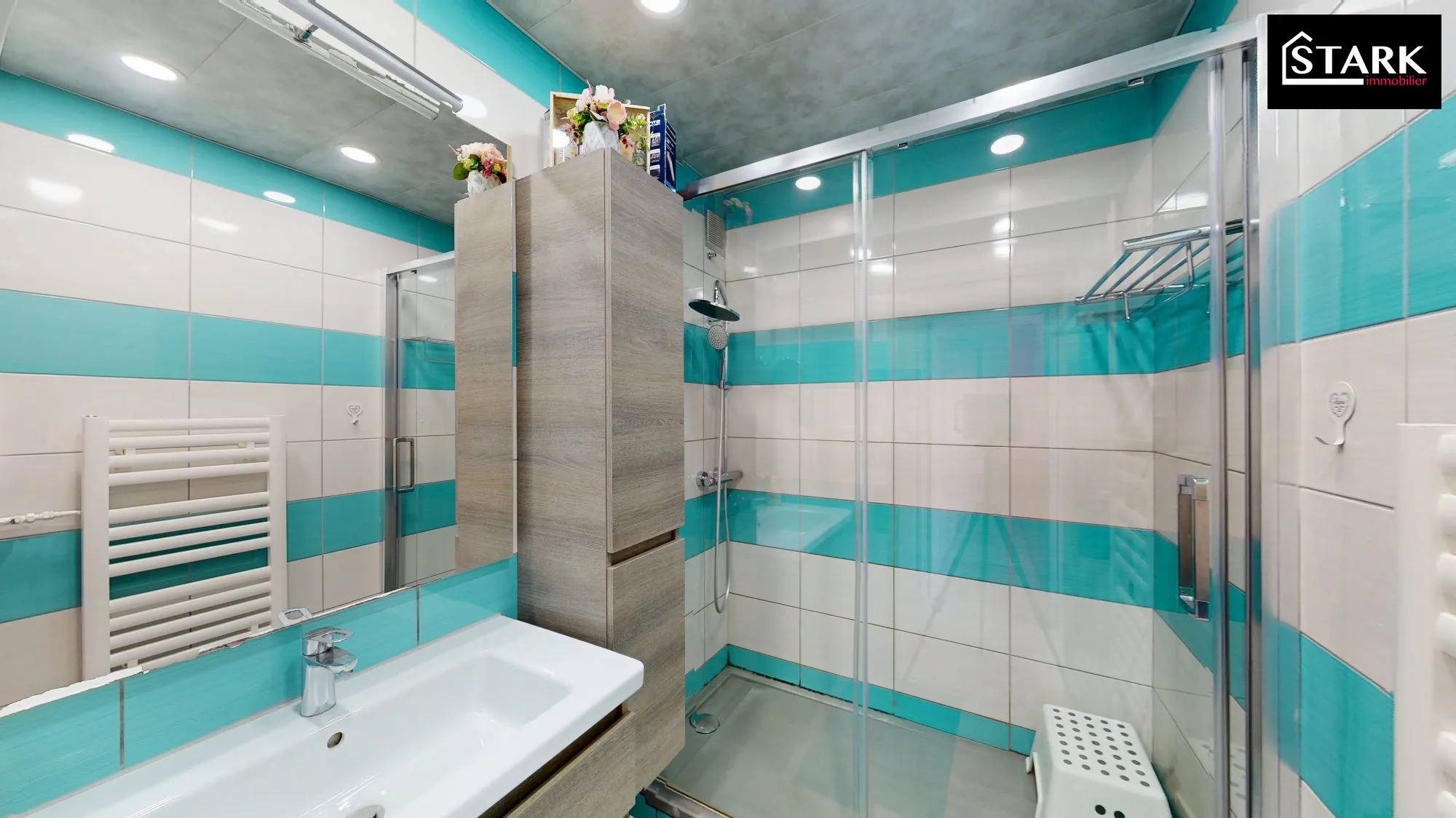 Appartement T4 lumineux de 80 m² à Montbéliard avec véranda et stationnement sécurisé 