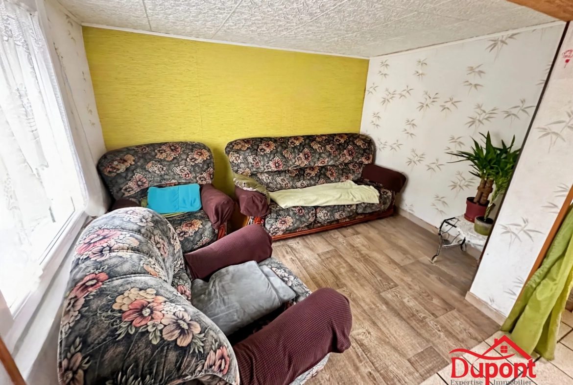 Maison à vendre avec jardin, garage et dépendances à Maubeuge 