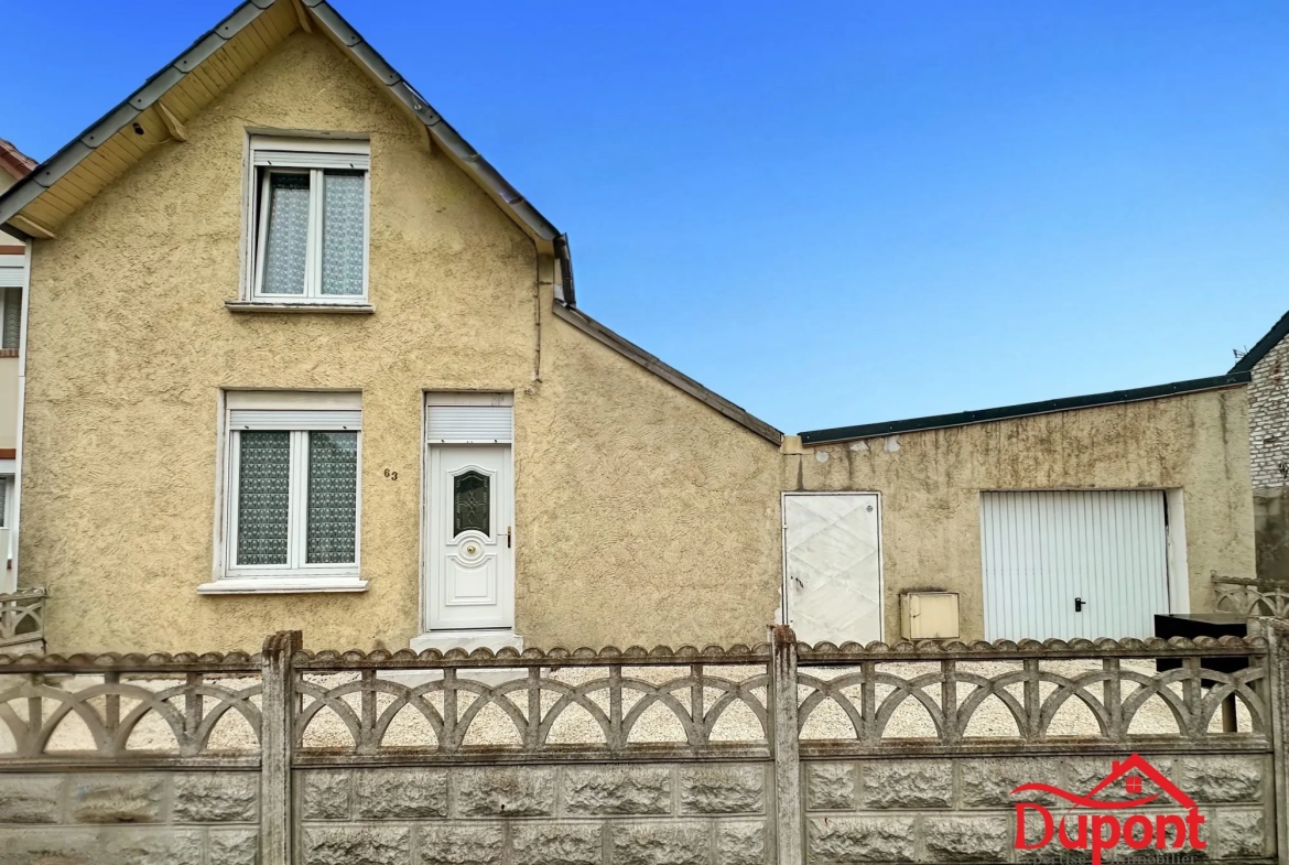 Maison à vendre avec jardin, garage et dépendances à Maubeuge 