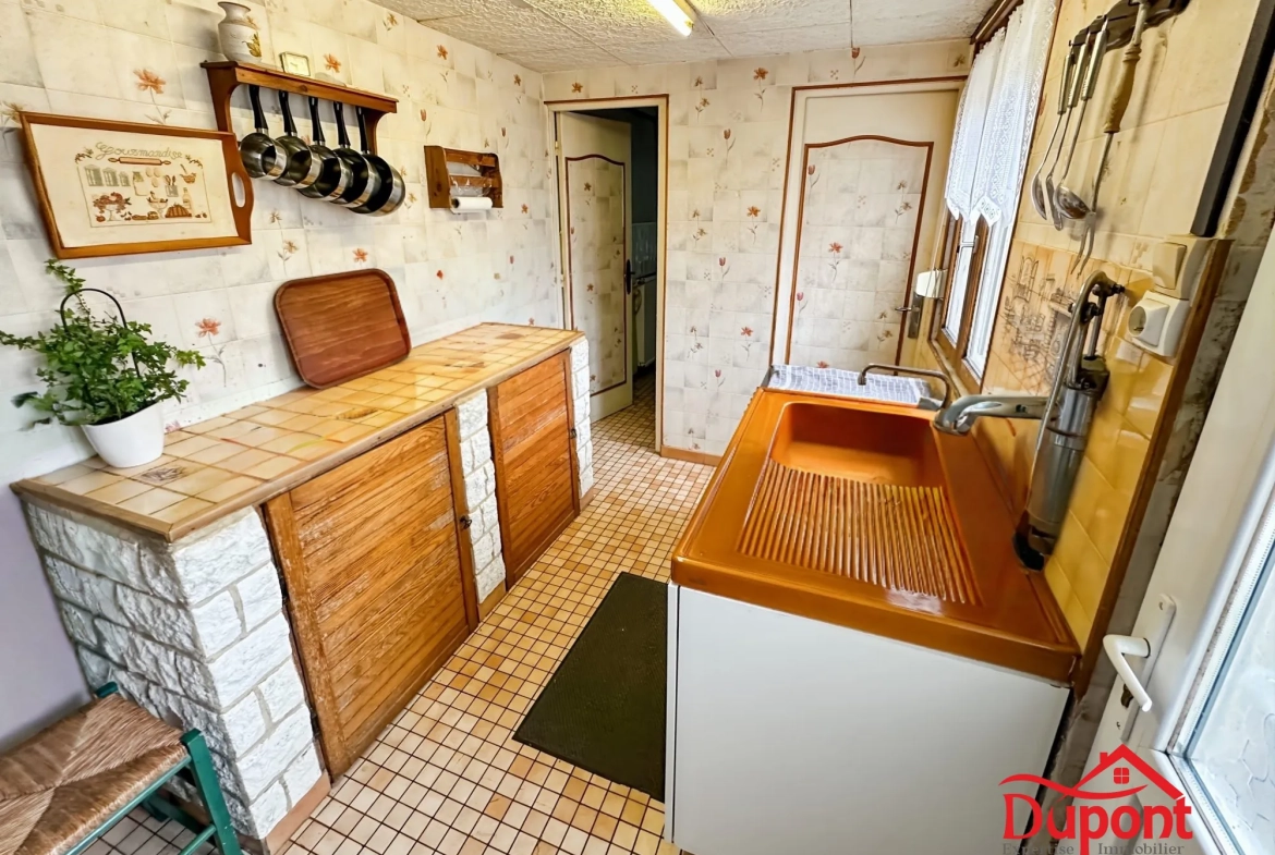 Maison à vendre avec jardin, garage et dépendances à Maubeuge 