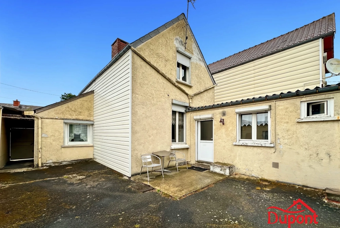 Maison à vendre avec jardin, garage et dépendances à Maubeuge 