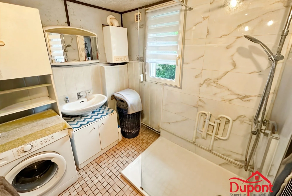 Maison à vendre avec jardin, garage et dépendances à Maubeuge 