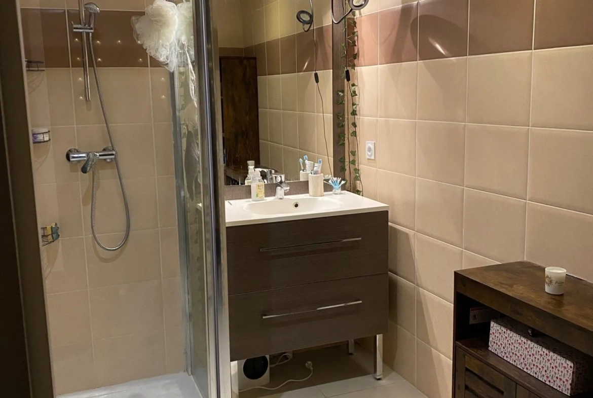 Appartement T1 à Gex de 33 m² avec stationnement et ascenseur 