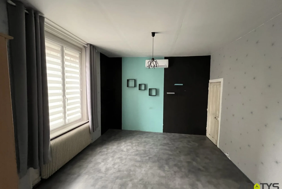 Maison semi-plane à vendre à Auberchicourt avec 3 chambres et jardin 