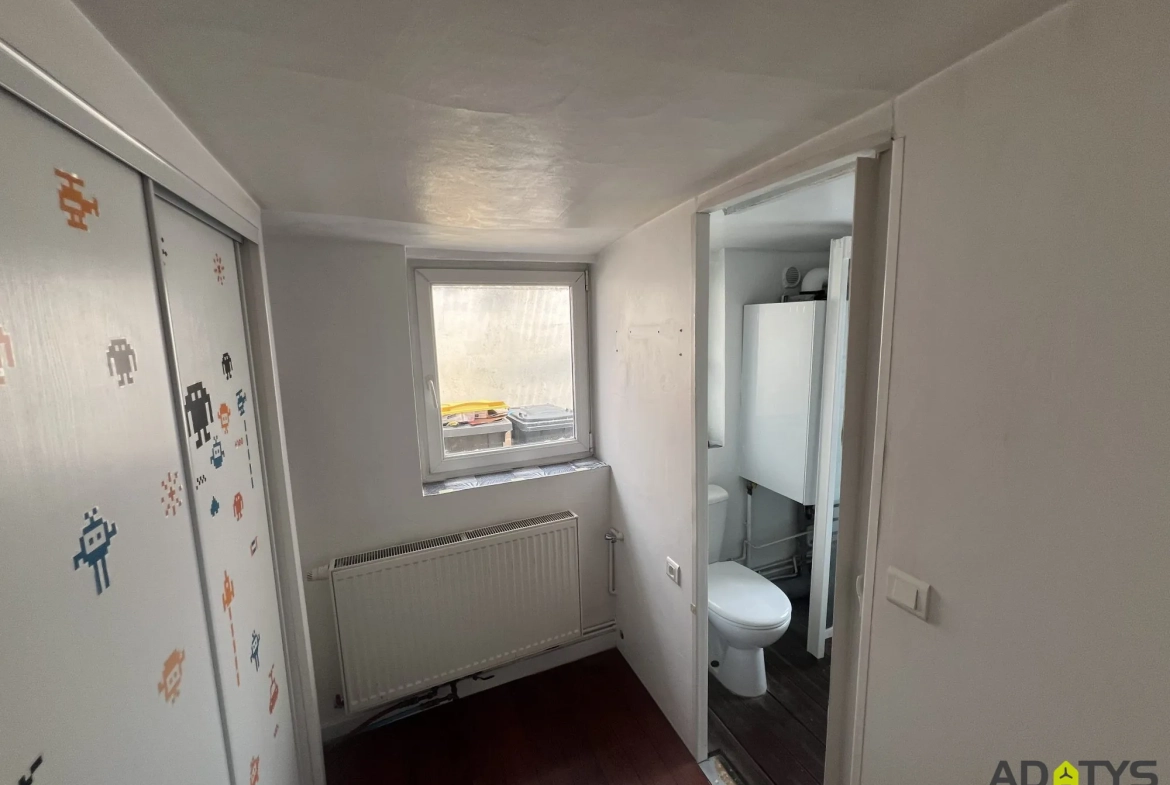 Maison semi-plane à vendre à Auberchicourt avec 3 chambres et jardin 