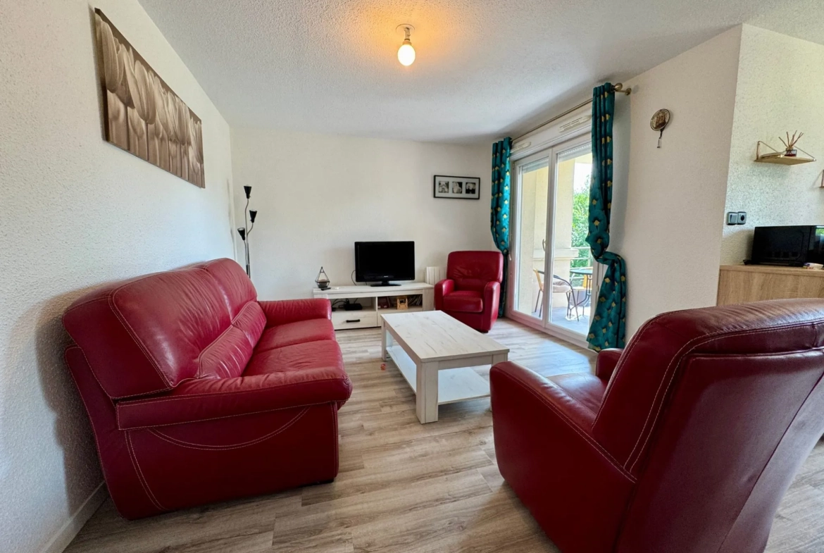 Appartement rénové de 54m² à Maubeuge avec terrasse et stationnement 