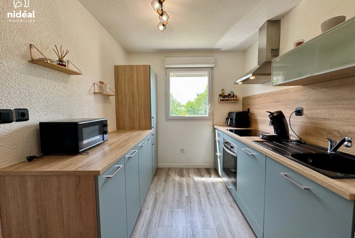 Appartement rénové de 54m² à Maubeuge avec terrasse et stationnement 