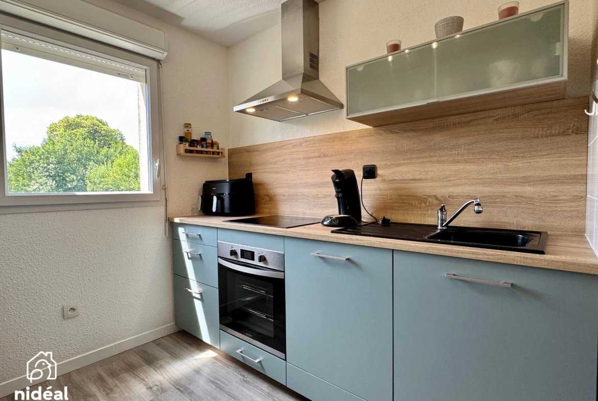 Appartement rénové de 54m² à Maubeuge avec terrasse et stationnement 