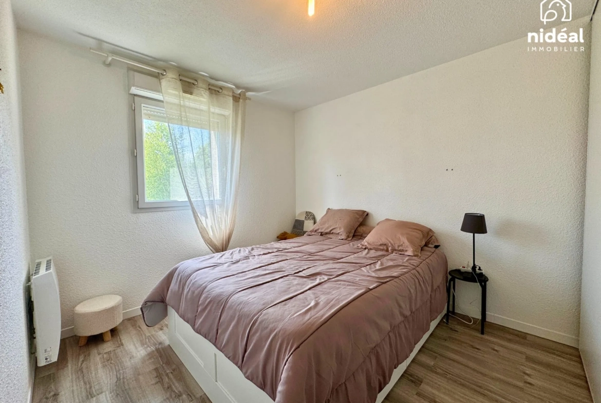 Appartement rénové de 54m² à Maubeuge avec terrasse et stationnement 