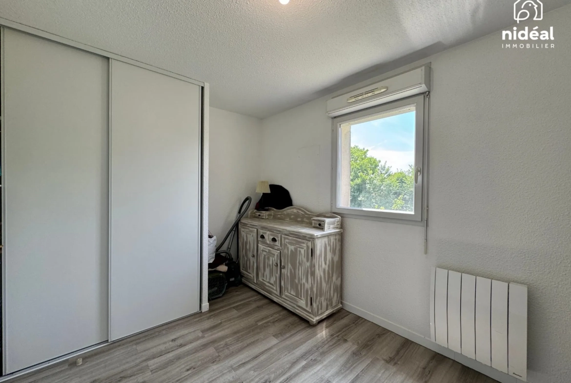 Appartement rénové de 54m² à Maubeuge avec terrasse et stationnement 