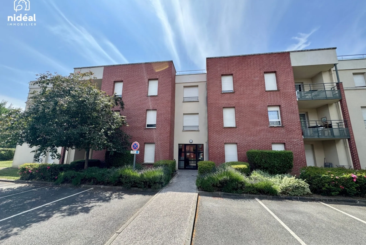 Appartement rénové de 54m² à Maubeuge avec terrasse et stationnement 