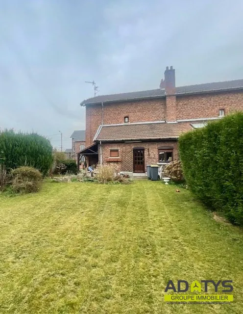 Charmante maison à vendre avec 2 chambres, garage et jardin à Corbehem 