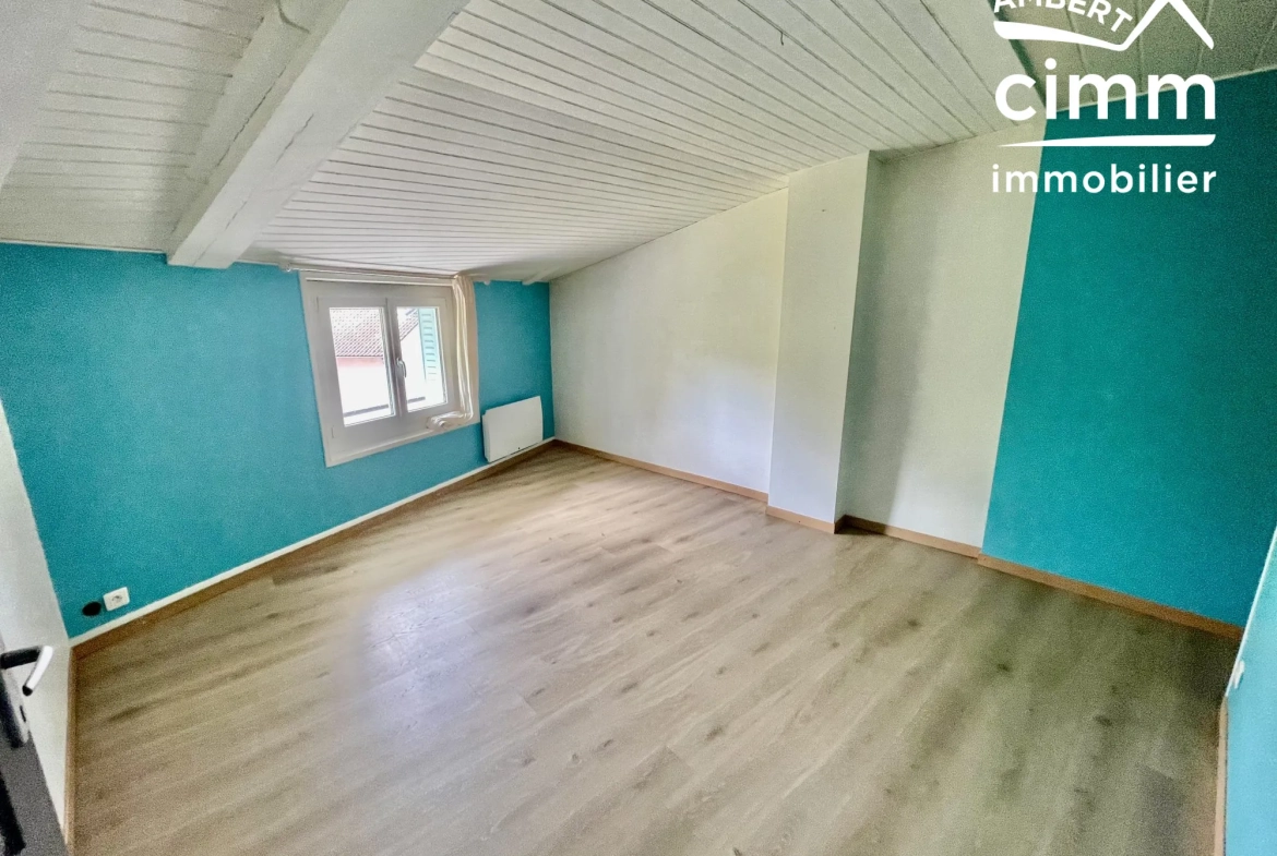 Maison de ville à vendre à Arlanc - 82 m² avec jardin et cave 