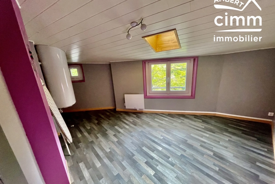 Maison de ville à vendre à Arlanc - 82 m² avec jardin et cave 