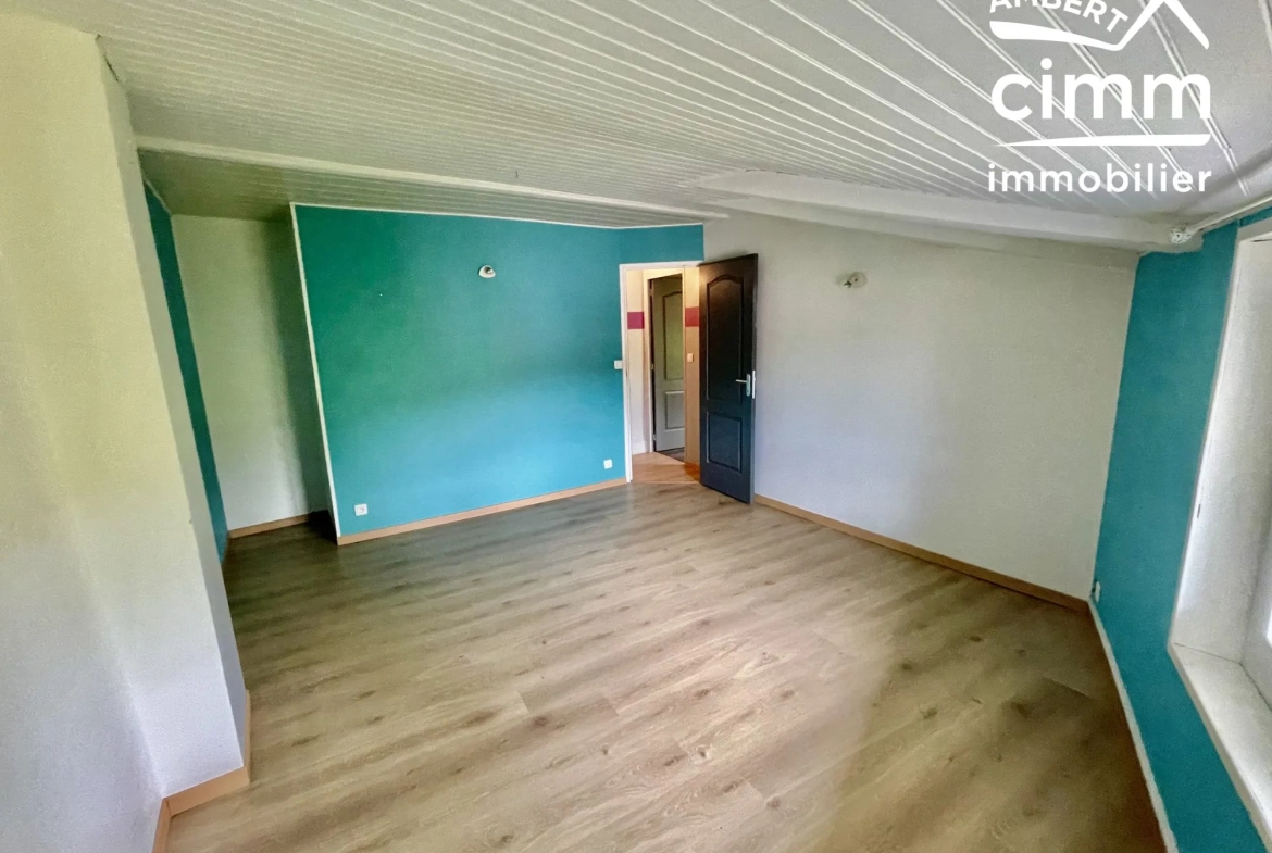 Maison de ville à vendre à Arlanc - 82 m² avec jardin et cave 