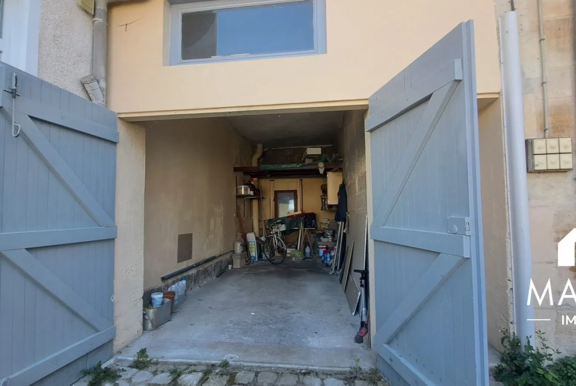 Maison de ville avec garage à Châlons-en-Champagne – Potentiel d'investissement 