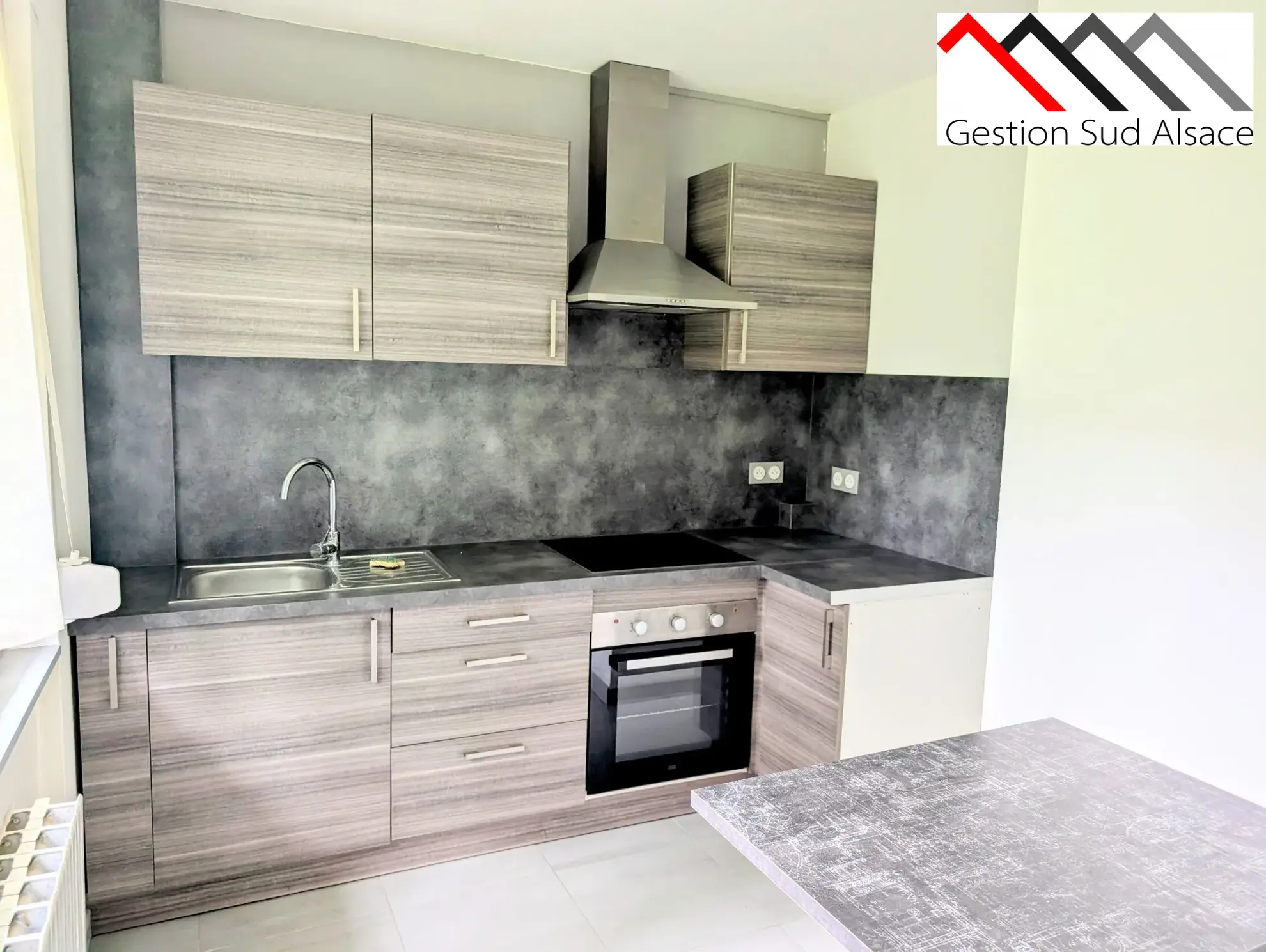 Charmant studio rénové de 24 m² à Rixheim avec vue verdoyante 