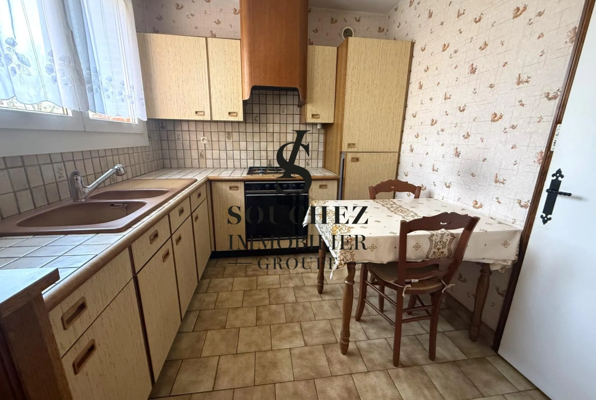 Maison à vendre à Lens avec jardin et garage - 97 m² 