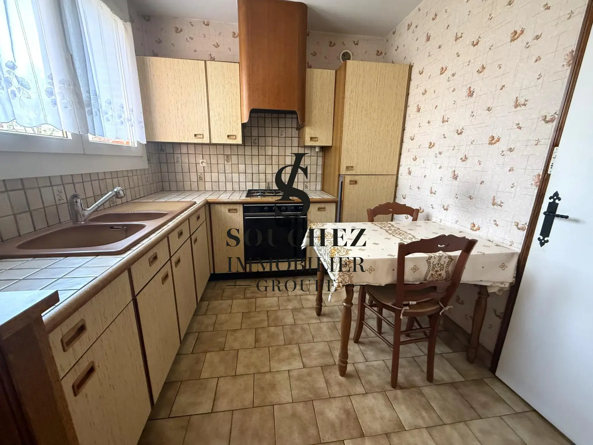 Maison à vendre à Lens avec jardin et garage - 97 m² 