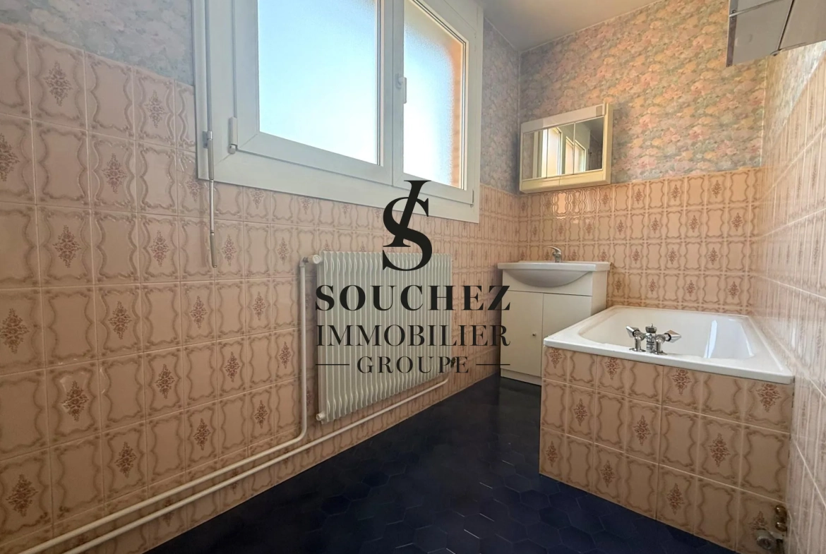 Maison à vendre à Lens avec jardin et garage - 97 m² 