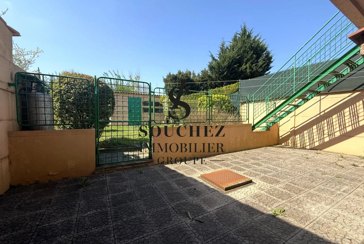 Maison à vendre à Lens avec jardin et garage - 97 m² 