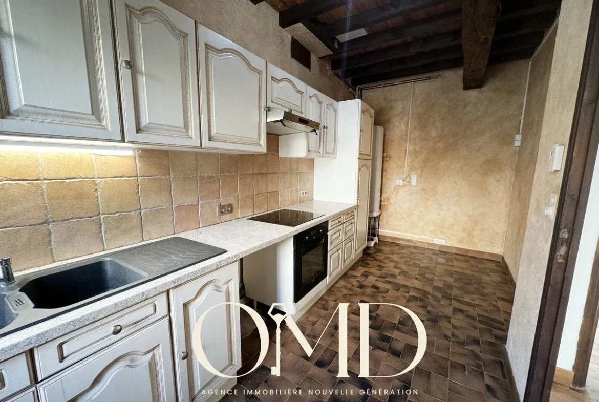 Maison mitoyenne à rénover de 91,18 m² à Marquefave – Proche commodités 