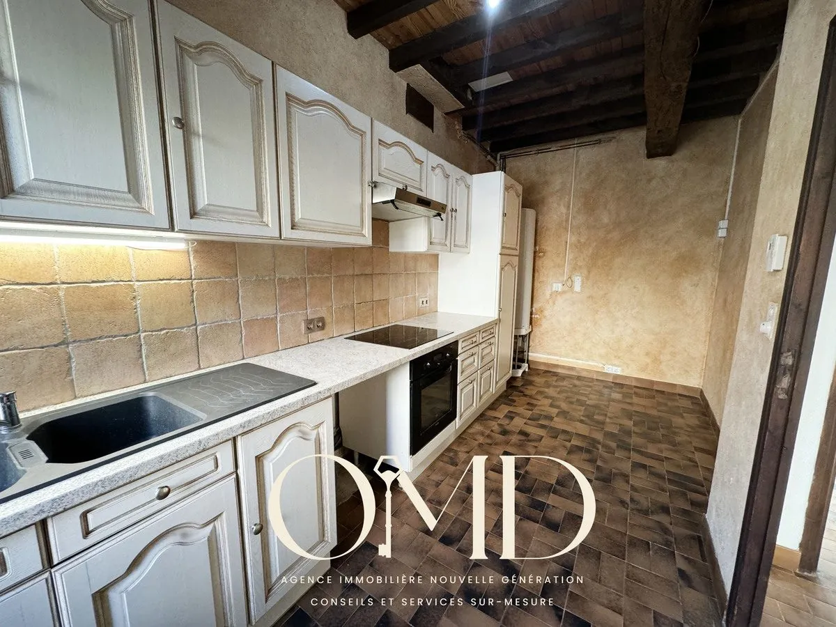 Maison mitoyenne à rénover de 91,18 m² à Marquefave – Proche commodités 