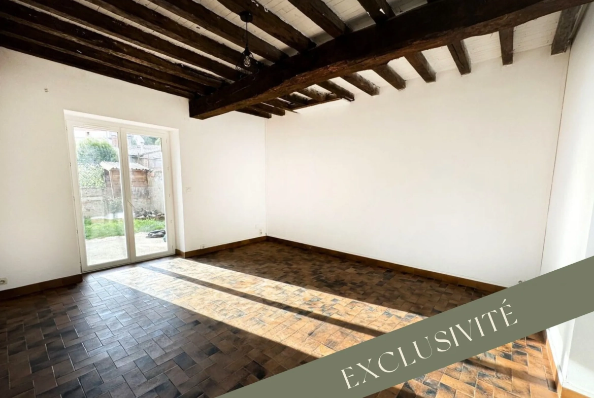 Maison mitoyenne à rénover de 91,18 m² à Marquefave – Proche commodités 