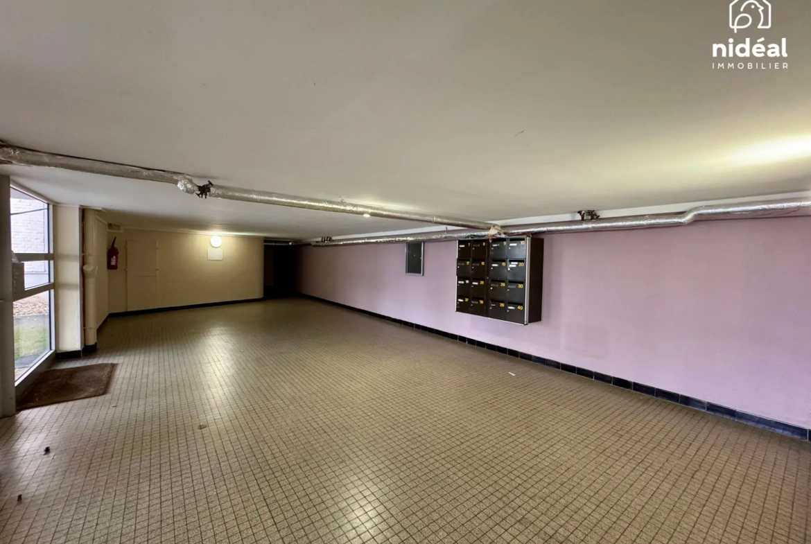 Appartement rénové de 66 m² avec balcon et garage à Maubeuge 