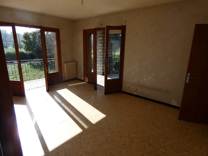 Maison à rénover avec grand jardin et garage à Labarthe-Rivière 