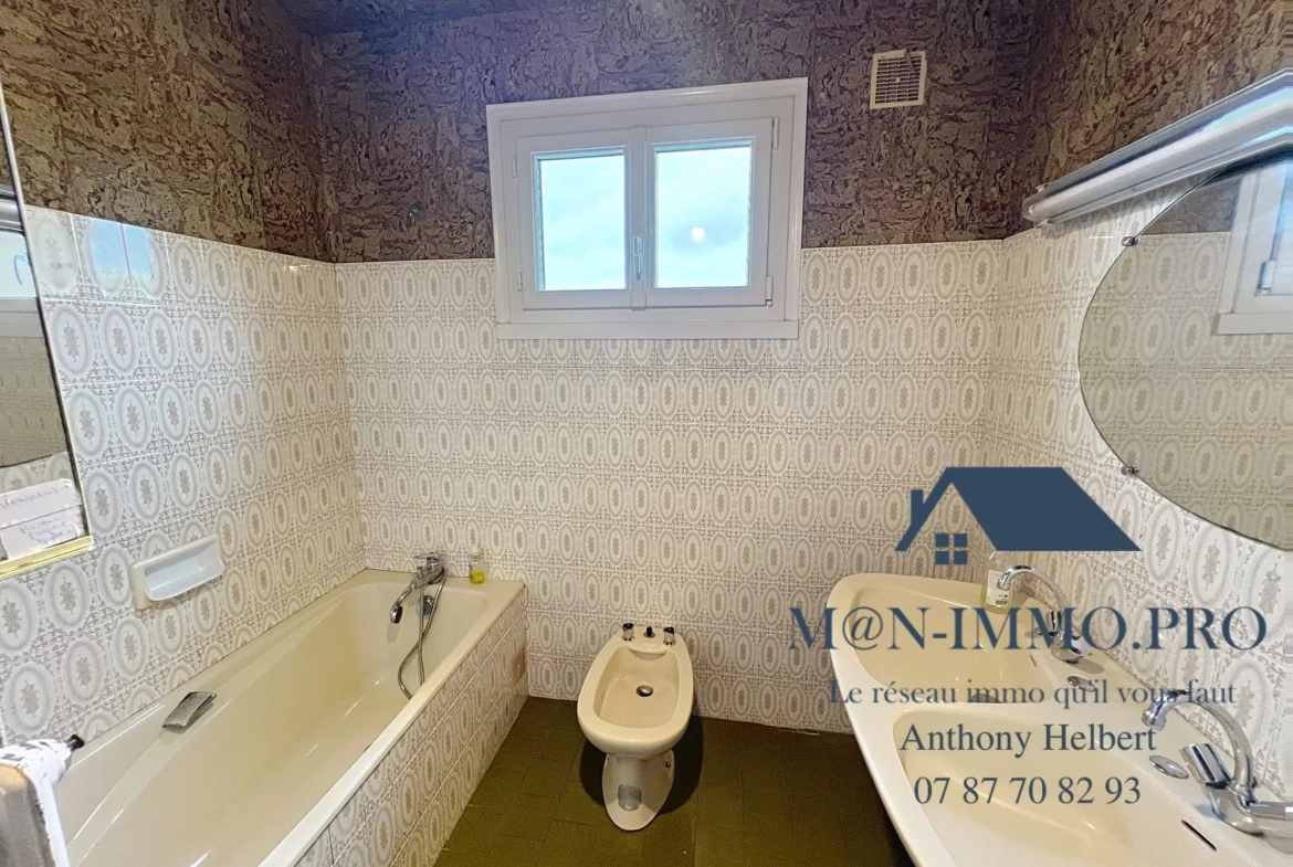 Maison familiale à Quessoy centre bourg - 115 m² avec sous-sol et potentiel d'aménagement 