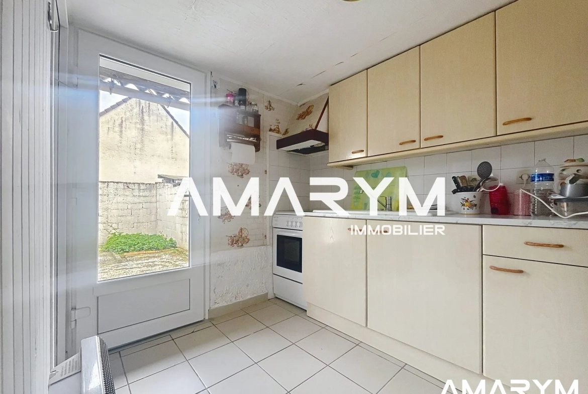 Maison de ville à EU avec cour de 30 m² – Opportunité à saisir 