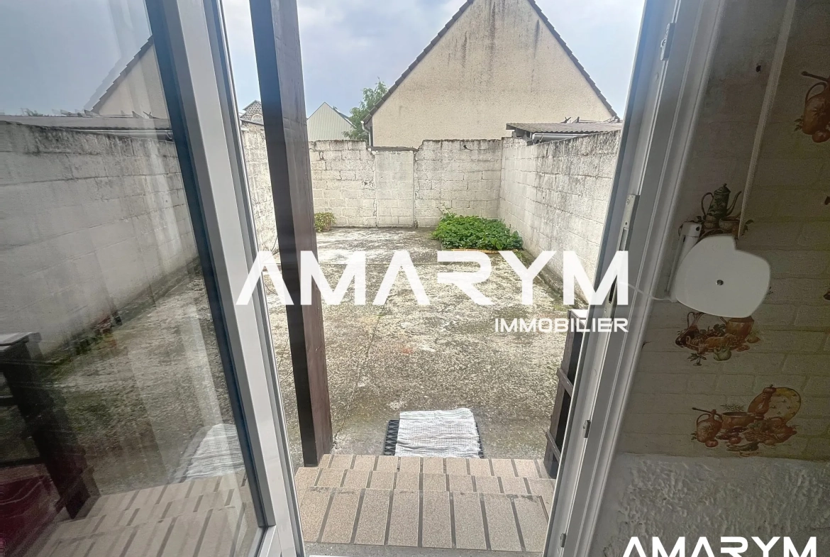 Maison de ville à EU avec cour de 30 m² – Opportunité à saisir 