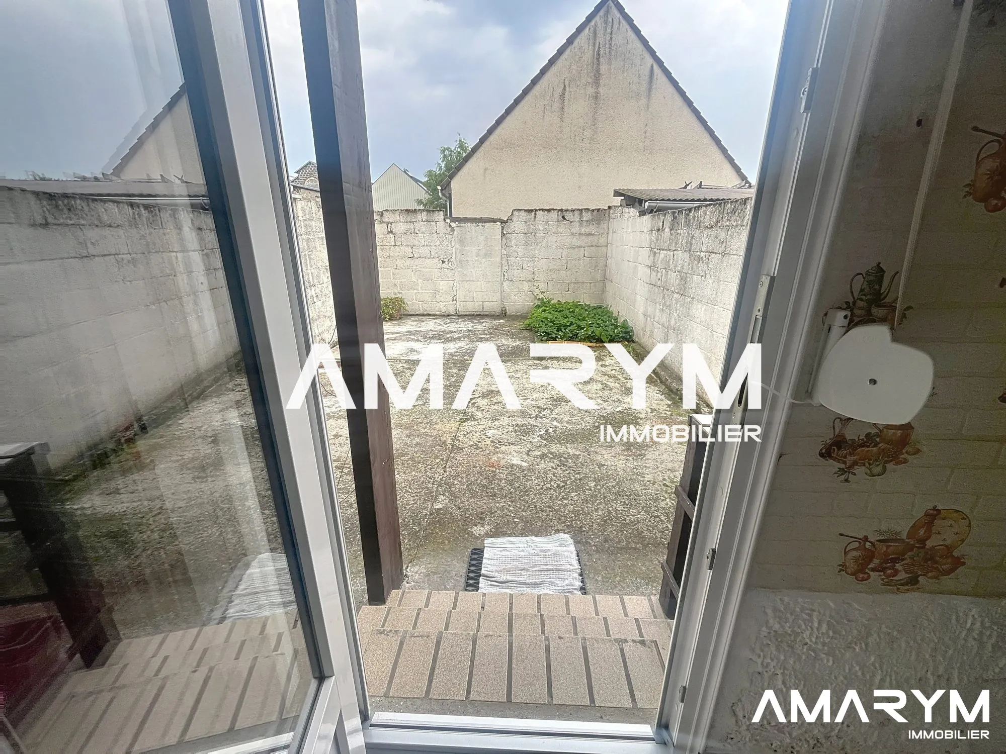 Maison de ville à EU avec cour de 30 m² – Opportunité à saisir 