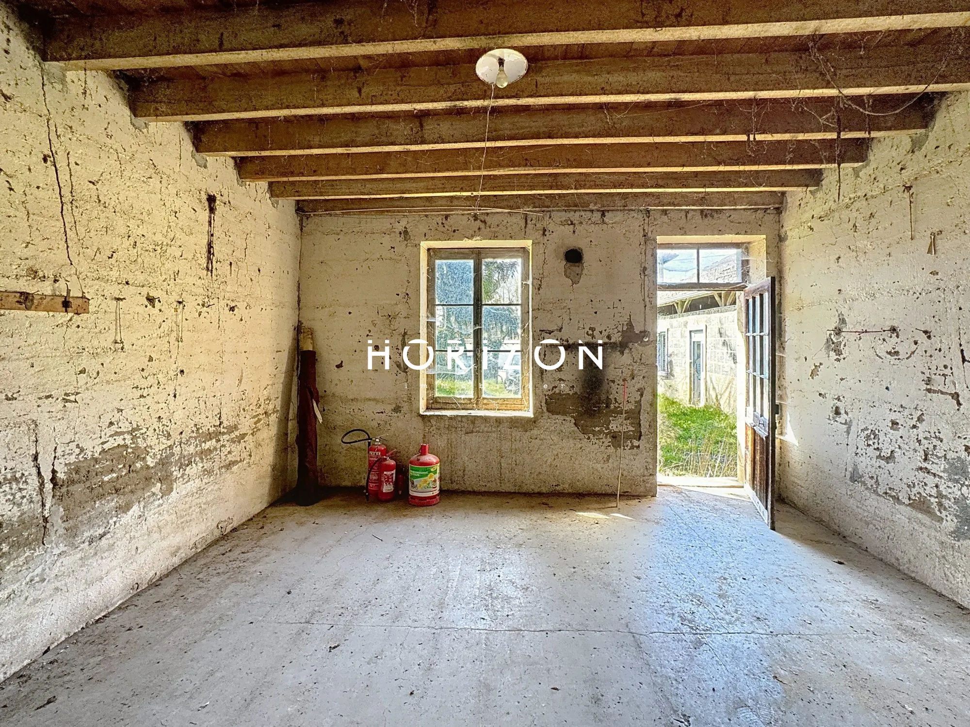 Maison à réhabiliter de 120 m² avec terrain de 624 m² à Cormoranche-sur-Saône 